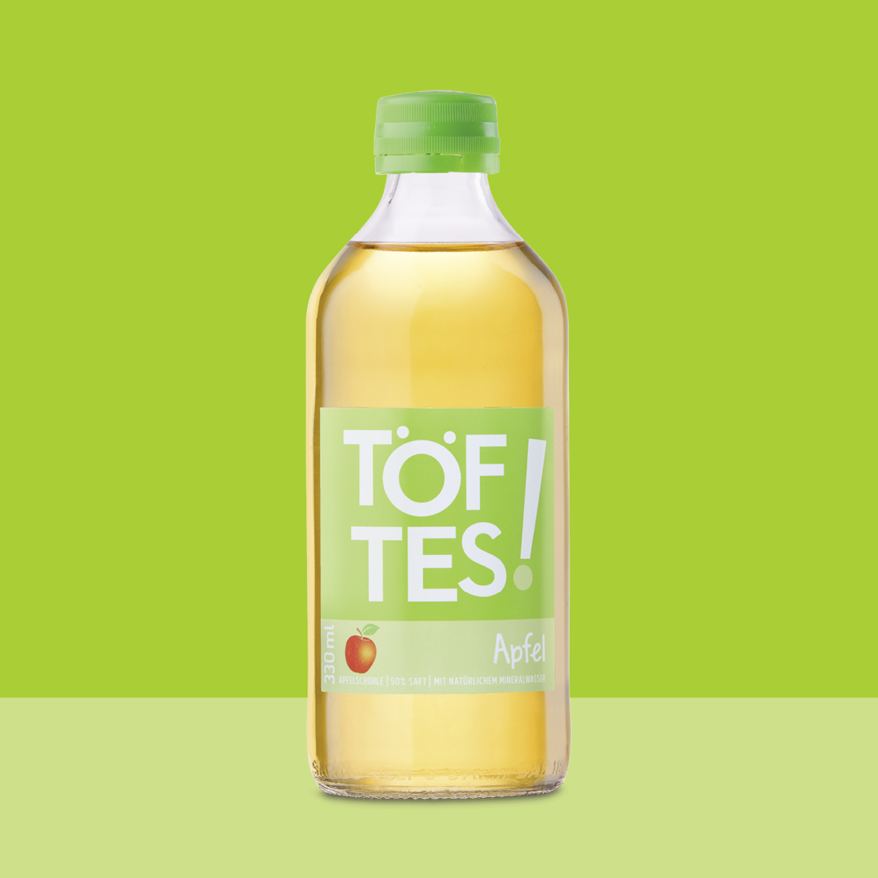 Produktabbildung Töftes Apfelschorle in der 0,33 Liter Glasflasche.