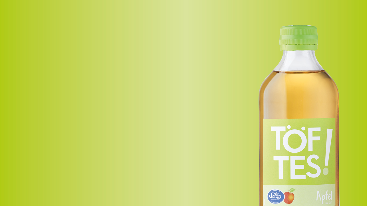 Produktdarstellung Töftes Apfelschorle in der 0,33 Liter Glasflasche.