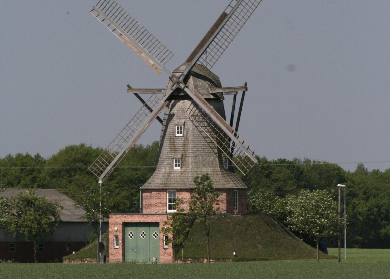 Darstellung einer Windmühle, die symbolisch für die Niederlande stehen soll.